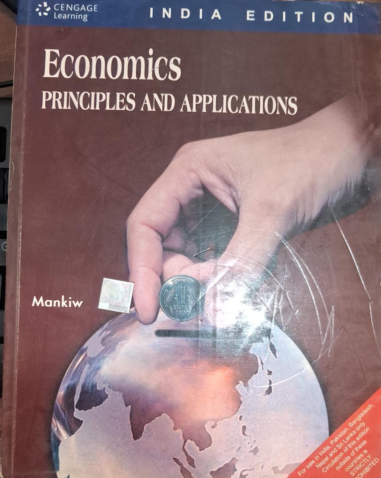 Economics Principles and Applications